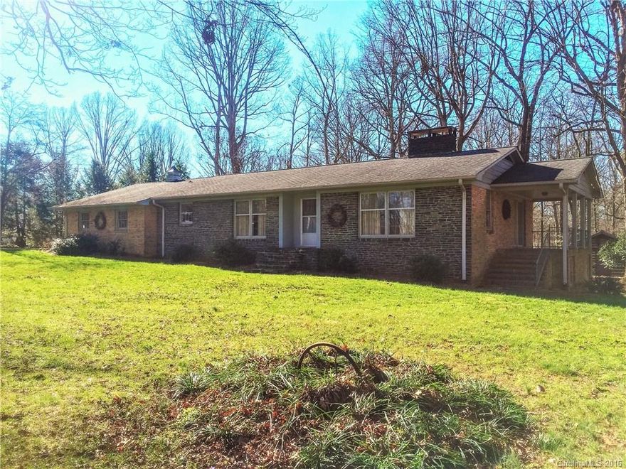 Enjoy your full brick & stone home located in a desirable rural neighborhood with a private wooded lot, established gardens, extensive landscaping and a walkout basement. Home is well maintained with only one owner. Gleaming hardwoods in living room & dining room! Large master bedroom with private side porch and gas log fireplace! Partially finished basement with additional fireplace offers potential bonus living space and additional bathroom. Mountains of possibility in a convenient location!