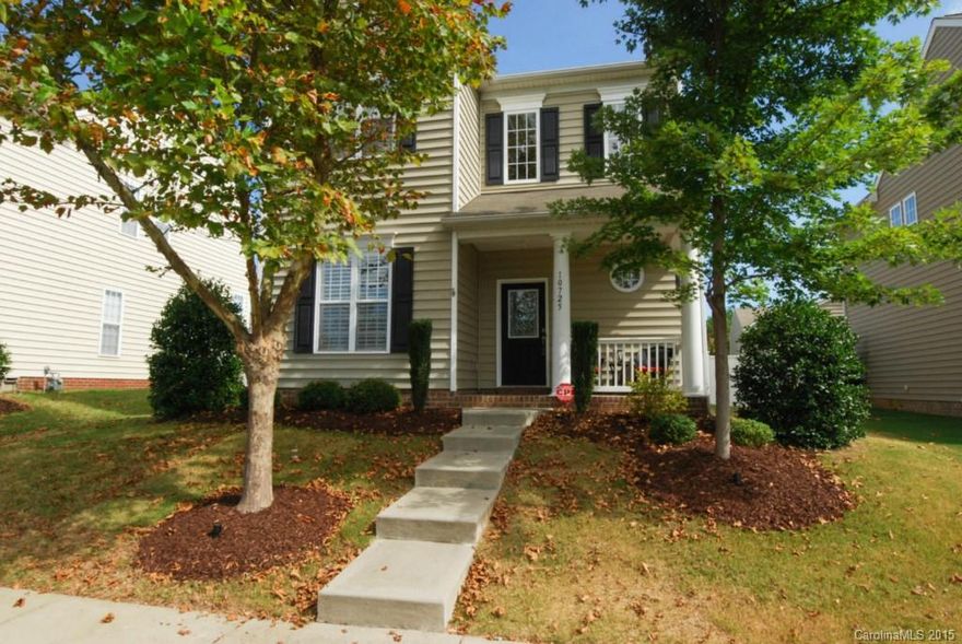 Charming, 2 story home in desirable Stone Creek Ranch. 1st flr features, grtroom & gas log fp, kitchen & breakfast area, din room with hard wood floor & trey ceiling & a private office/play room, crown molding & plantation shutters. 2 story foyer leads to 2nd level & a spacious master suite, laundry, 2 charming bdrms. Oversized 2 car garage with alley access, privacy/fenced rear lawn, patio and a great play area with playset. Close to Ballantyne, Stonecrest & Blakeney, I-485 and great schools.