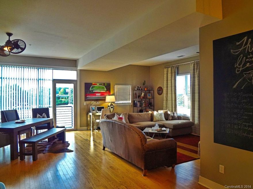 Unbelievable opportunity in Third Ward. One of a kind end unit with private patio overlooking Panther Stadium. Condo is the largest unit in the complex. Home has many updates, new quartz countertop, under mount sink, upgraded master bath, new paint. Features three outdoor patio areas. Walk to Panther and Knights games, or to the new local bar Draught. Easy access to 77 and all of Uptowns amenities. Do not miss this opportunity.