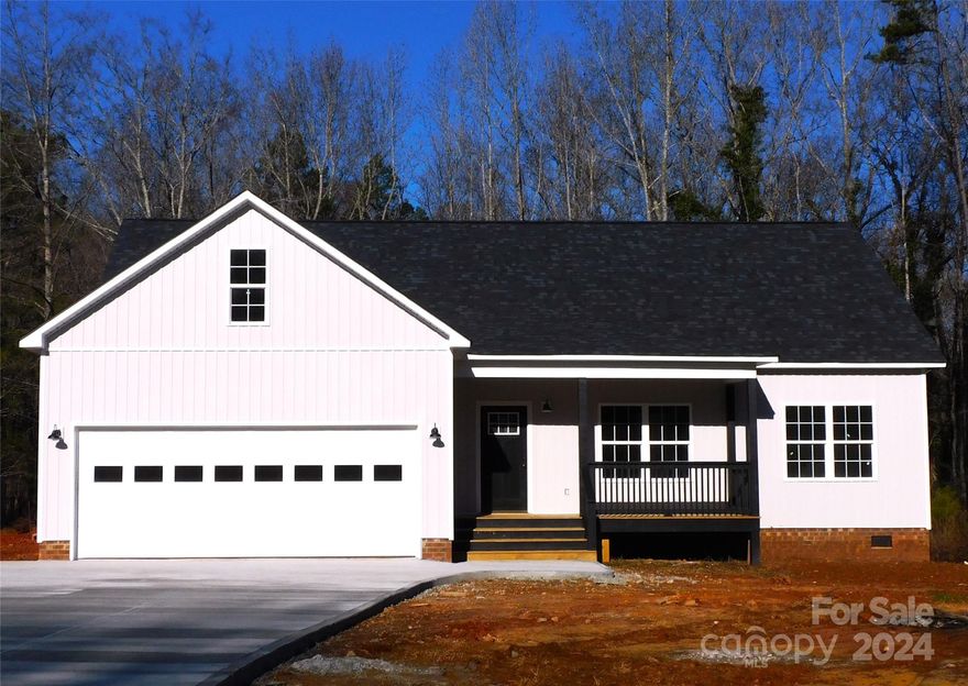 New Construction in the country, but just 2 minutes to shopping and schools.  3 Bedroom with 2 baths, granite countertops thru out.  Vinyl plank flooring, cover front and rear porches.  Large attached garage on 1 ac.  Well and septic.  Concrete drive and plenty of room to roam!  Broker/Owner.