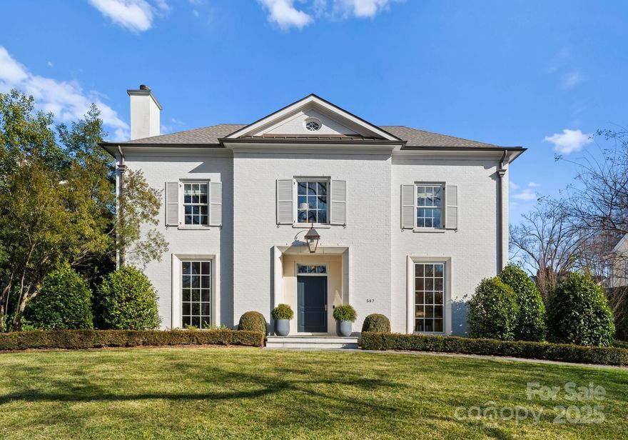 Designed by Greg Perry and custom-built by Knight in 2018, this distinguished Eastover residence exemplifies luxury blended with comfort and functionality. The sun-drenched open floor plan features floor-to-ceiling windows and 10' ceilings. The main level showcases formal living and dining room, wet bar w/ 180-bottle EuroCav wine refrigerator, and gourmet kitchen affixed with Wolf 6-burner gas range, SubZero paneled appliances, custom Zephyr hood, and walk-in pantry. Expansive family room connects to a covered bluestone veranda overlooking the heated saltwater pool and spa with private enclosed yard. Upstairs includes primary suite w/ fully-appointed honed marble bathroom and walk-in closet, plus three secondary ensuite bedrooms all with walk-in closets. The 3rd floor offers a large bonus and fifth en-suite bed/bath. Detached two-car garage with upstairs living quarters and full bath. This impressive home seamlessly combines sophistication with modern amenities and luxury finishes.