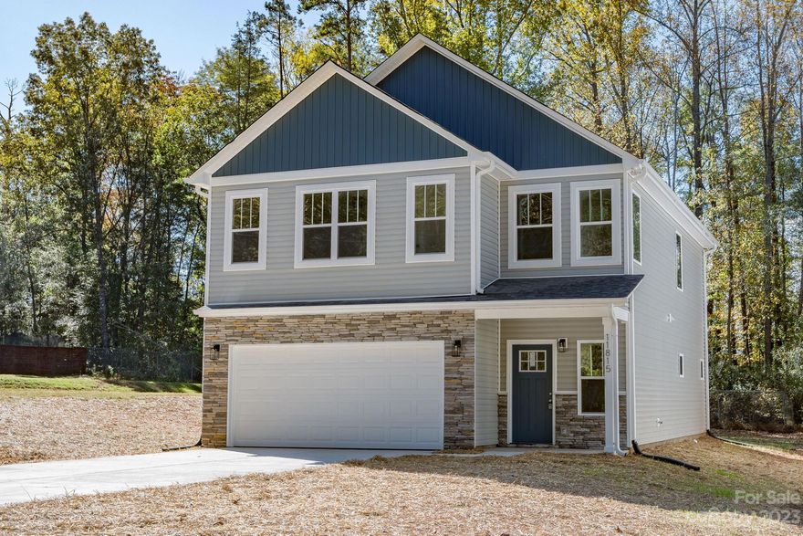 PRICE IMPROVEMENT! New Construction 2 story, 4-bedroom, 2.5 bathroom in the desirable area of Huntersville is a Must See! Walk into a spacious foyer and into the adjoining living room, kitchen and dining area that features beautiful waterproof LVP flooring throughout the main level. Then make your way upstairs where you will find 3 comfortable size bedrooms and walk into a large primary bedroom featuring 2 closets and an ensuite bath with double vanity with, quartz countertop, garden tub and beautifully tiled shower wall and ceiling. This beautiful home features recessed lighting throughout, beautiful light fixtures, quartz countertops, recessed lights, custom cabinetry in kitchen and bathrooms, tile backsplash and in primary shower, stainless steel appliances, the list goes on! Lastly make your way to flat and nicely graded yard and enjoy the serene sounds of nature. Move in Ready, Come By...Fall in Love…Make an Offer! PRICE REDUCED!!