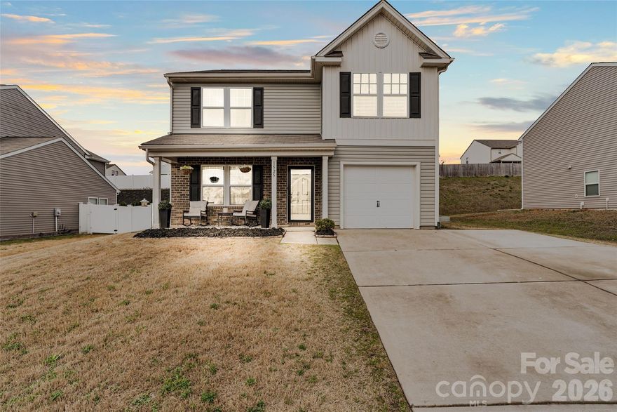 Seller offering $5,000 towards buyer's closing costs! Step into a lifestyle of modern comfort and effortless entertaining in this stunning 4-bedroom Austen Lakes gem. The heart of the home is a show-stopping kitchen, featuring rich navy cabinetry, warm butcher block countertops, and sleek white appliances finished with elegant gold trim. A central work island flows seamlessly into the bright breakfast bar, ensuring the chef is always part of the conversation in the open-concept living area. The spacious primary suite serves as a private retreat with dual sinks and a large walk-in closet, while three secondary bedrooms are situated on the opposite end of the home. The living space extends outdoors to a charming enclosed sunroom—perfect for year-round relaxation—which leads to a paver patio and a privacy-fenced backyard complete with a built-in playhouse. Built in 2019 with a contemporary aesthetic throughout, this home is perfectly designed for making memories.