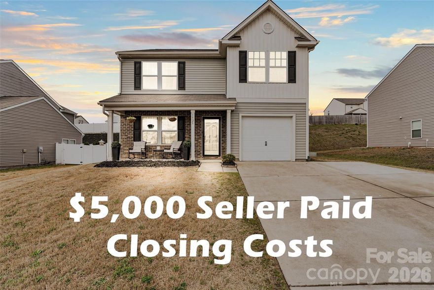 Seller offering $5,000 towards buyer's closing costs! Step into a lifestyle of modern comfort and effortless entertaining in this stunning 4-bedroom Austen Lakes gem. The heart of the home is a show-stopping kitchen, featuring rich navy cabinetry, warm butcher block countertops, and sleek white appliances finished with elegant gold trim. A central work island flows seamlessly into the bright breakfast bar, ensuring the chef is always part of the conversation in the open-concept living area. The spacious primary suite serves as a private retreat with dual sinks and a large walk-in closet, while three secondary bedrooms are situated on the opposite end of the home. The living space extends outdoors to a charming enclosed sunroom—perfect for year-round relaxation—which leads to a paver patio and a privacy-fenced backyard complete with a built-in playhouse. Built in 2019 with a contemporary aesthetic throughout, this home is perfectly designed for making memories.