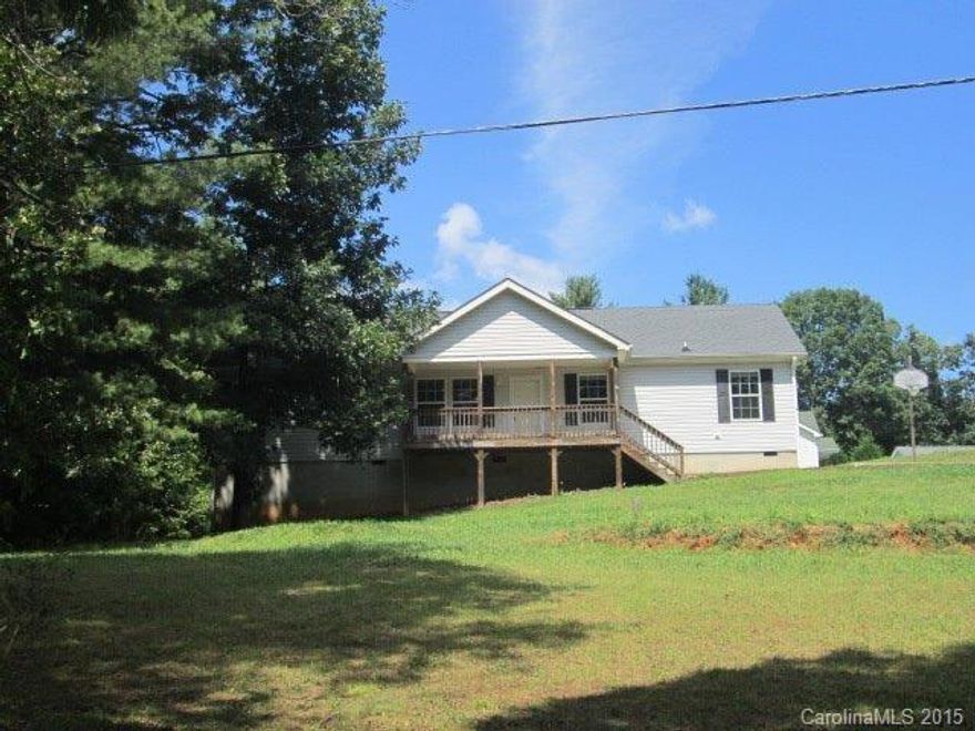 Freshly painted and new carpet. Large one level living on .56 acre lot in cul de sac. 2 bedrooms, 2 baths, open floor plan, dining rm, kitchen island, office (flex room), lots of kitchen cabinets and counter space, split bedroom plan. Large laundry room, large walk in closet in both bedrooms. Covered front porch with winter mountain views and back porch deck. High crawlspace with storage for your lawn equipment. Plenty of room to play in front yard.   HomePath Ready Buyer Program available.