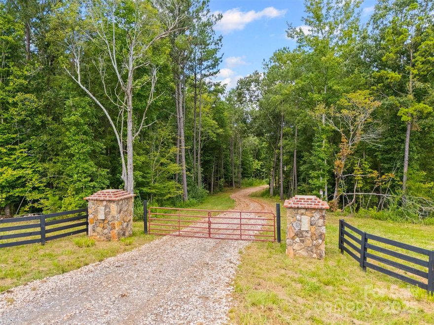 Bring your builder to this beautiful land and build your forever home! Enter the property through the stone columns, 4-board KY Fence while you drive through the graceful winding stone drive, leading you to your open, private cleared future homesite. Enjoy the private home setting with nature at its best including the peaceful winding creek that runs to along the back of the property. Award winning Clover school district. Great location being minutes from Clover, downtown York and Kings Mountain State Park with hiking, equestrian trails and camping. Only 15 minutes from interstate 85 and approximately 45 minutes to Charlotte.