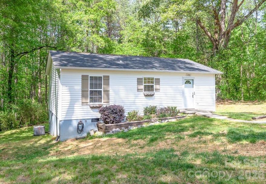 This move-in condition ranch home has 0.72 acres with it that backs to and sides to quiet and peaceful woods; The sale includes a 0.13 acre lot along with the 0.59 acre lot the home sits on; Driving up to the home, you will feel enveloped by the woods; Just imagine the wildlife you can watch from the back deck! Enjoy the open living room, dining area and kitchen; The kitchen has wood cabinets, a double stainless steel sink and a newer dishwasher, stove and refrigerator; Wood laminate floors are in the entire home along with ceiling light fans in the living room and bedrooms; Light fixtures have been updated nicely and the interior doors have 3,4 and 6 panels; You'll love the spacious bathroom with its stall shower, elongated toilet and newer sink and vanity; The outside of the home is in great condition with its architectural shingle roof, vinyl siding and vinyl windows; Other features include insulated front and rear doors, a brand new water line to the road, a new HVAC in 2021 and an easily navigable crawl space; Nothing to do here but move in and start enjoying the peace and quiet;