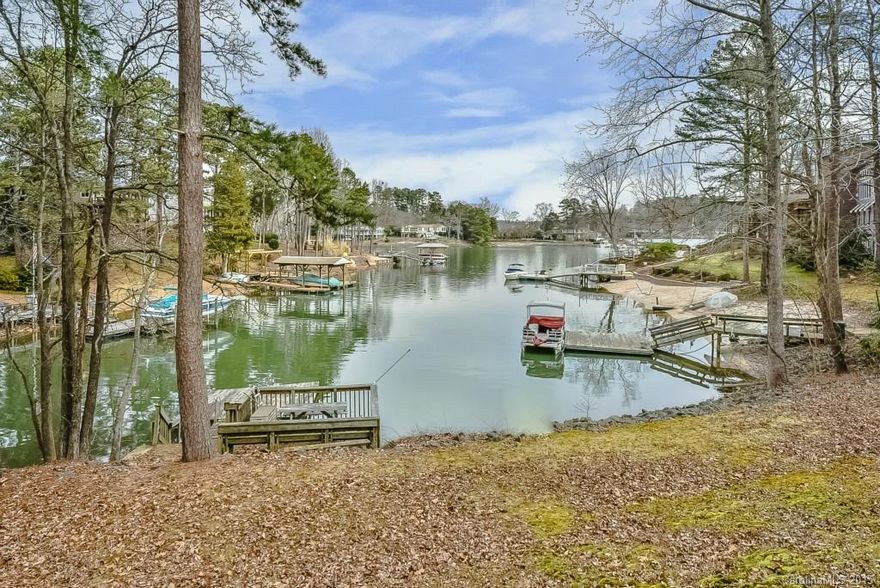 Enjoy the summers on the Lake. This Beautiful one story basement home in the cove on Lake Wylie features a Floating deep water dock. The home has been updated: HVAC upgrades in 2012, Bathroom upgrades, granite in kitchen in 2010, New appliances in 2009, New roof in 2005, Jetted tub in 2012, and New deck railing  Amazing view from the home. No HOA!!