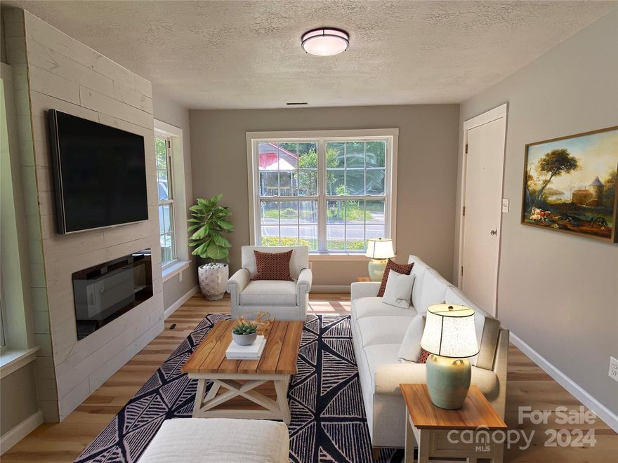 Imagine a home that seamlessly blends modern updates with a comforting feel.  This 2 bedroom, 1 bath home exuberates the feeling of home with new flooring throughout, updated cabinets, counter tops, farmhouse sink, appliances, subway tile backsplash, and dining area.  The bathroom is updated with ceramic flooring and ceramic tub.  This home is absolutely adorable and centrally located to shopping, the bypass, Hwy 521, and the greenway.  Make 428 Clinton Ave. in Lancaster, SC your new home.  Seller is motivated to sell!