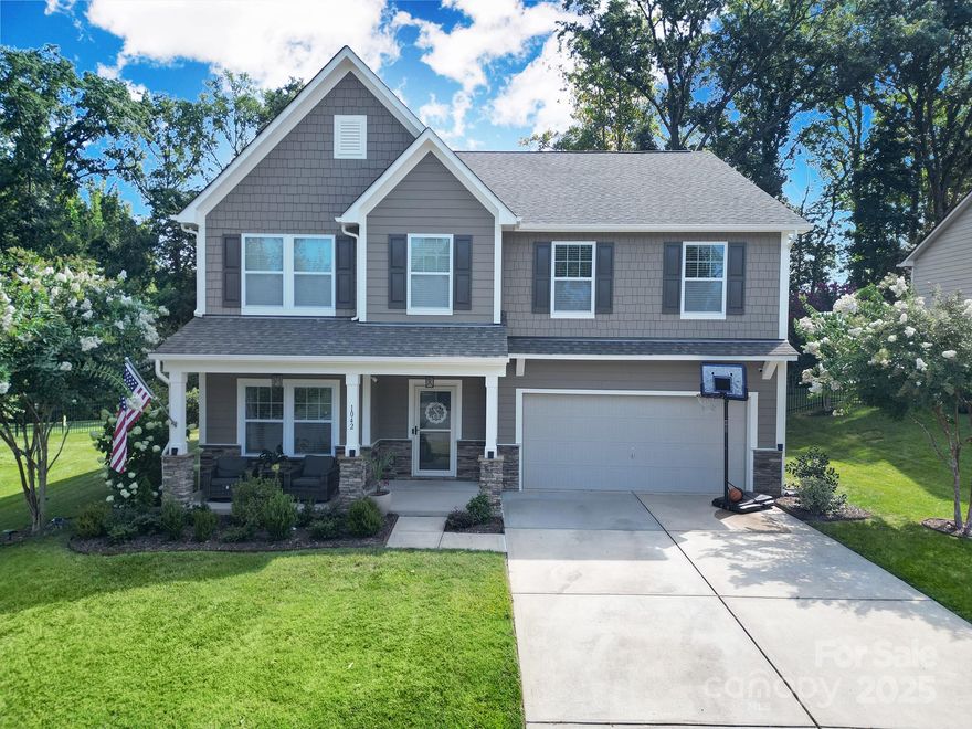 Unbeatable Location! Meticulously maintained and move-in ready! Nestled in sought-after Fox Ridge community, this stunning 3,400 sq ft two-story home on a private cul-de-sac is an absolute gem! Tons of natural light. Entire exterior painted (2024). This open concept home boasts a gourmet kitchen with custom cabinetry, granite countertops, ss/appliances, gas cooktop, refrigerator that conveys, double oven, designer pendant lighting & walk-in pantry with custom ELFA shelving. Washer/dryer & garage refrigerator also convey. Hardwoods on main in all living areas, staircase & upper hallway. The great rm shines with show-stopping stacked stone fireplace, complete with new custom-built shelves and cabinetry. Study has built-in wall to wall custom cabinetry. Newly painted downstairs and new carpet upstairs. Enjoy the spacious private fenced backyard with Pear, Cherry & Plum Tree's plus, an extended patio. Minutes from shopping, dining and more. Don't miss this RARE find! Low SC taxes!