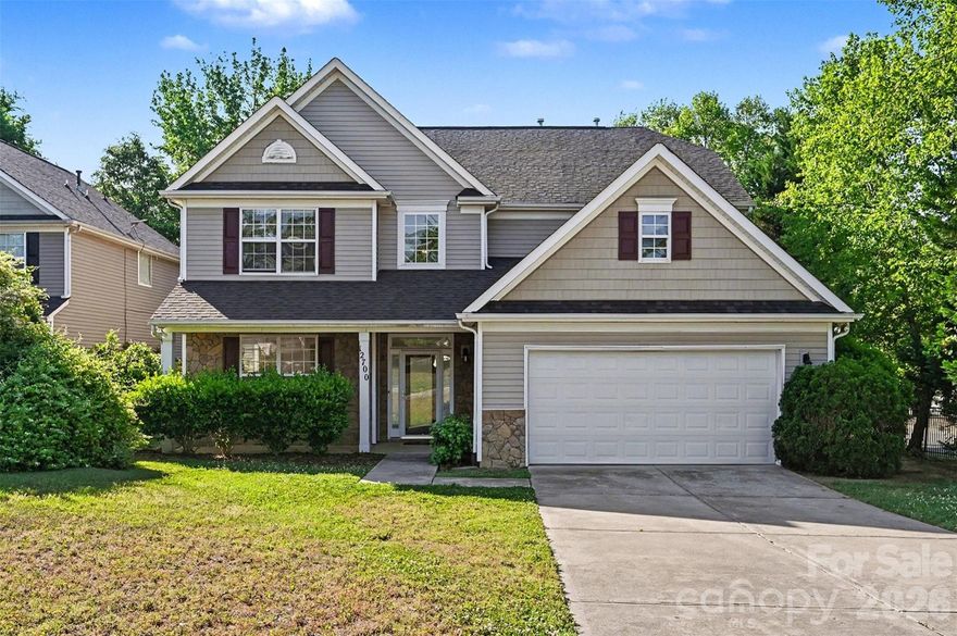 Welcome to this beautifully maintained two-story home where curb appeal and comfort come together from the moment you arrive. Inside, natural light pours into an open and airy main level, thoughtfully designed living spaces create an ideal setting for both everyday living and entertaining. The layout flows effortlessly from the main living area into a bright sunroom, offering a peaceful retreat with views of the backyard. The kitchen serves as the heart of the home, featuring generous counter space, a central island, and seamless connection to the surrounding living and dining areas. Upstairs, the home continues to impress with spacious bedrooms and a versatile loft-style sitting area that can easily adapt to your needs, whether as a home office, media space, or additional lounge. The primary suite is a true retreat, highlighted by a tray ceiling, abundant natural light, and designed for relaxation. Step outside to enjoy a private, fenced backyard with plenty of room to unwind, garden, or host gatherings. The outdoor space offers a balance of open lawn and shaded areas, creating a comfortable extension of the home. Enjoy access to neighborhood amenities including a community pool and shared outdoor spaces that encourage connection and recreation. The location places you just minutes from shopping, dining, and everyday conveniences, with easy access to major roadways, nearby parks, making commuting and exploring Charlotte enjoyable! This home blends space, comfort, and location into one inviting opportunity in a well-established neighborhood.