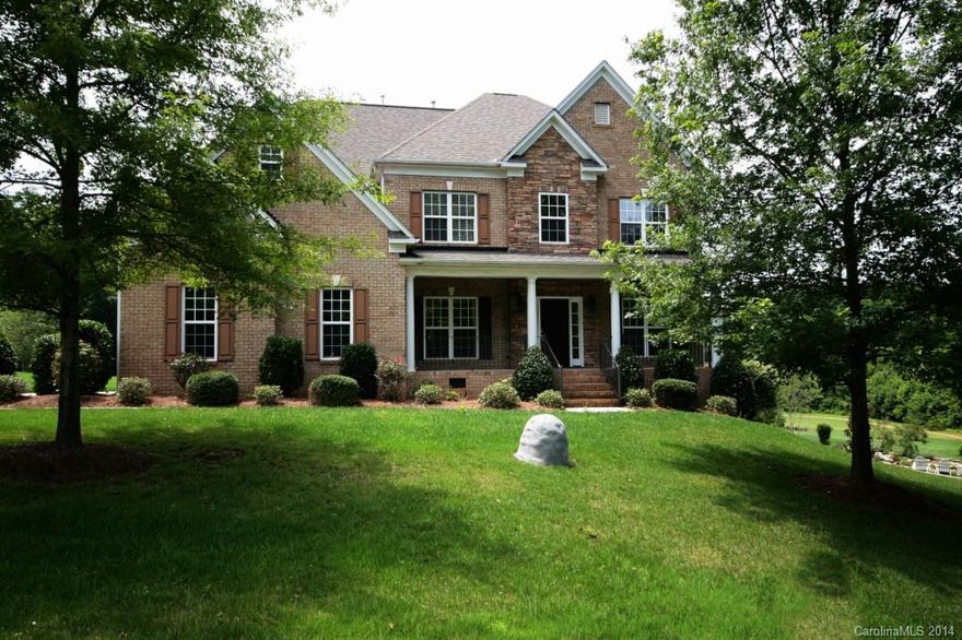 Stunning full brick culdesac home located in desirable Anniston subd. offering Davidson address & low Iredell taxes. The 2-story greatroom looks out upon your large private backyard adjoining a non-buildable common area. Upgraded kit includes SS appls, cherry cabs & granite ctops. The beautiful master suite has a fireplace, trey ceiling, & huge walk-in closet.  Master bath newly renovated, new granite in all baths, fresh paint, new carpet, hardwoods refinished.  This is a must see house!