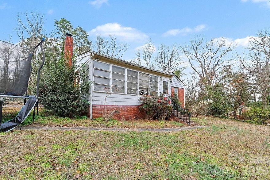 This charming 3-br, 2-ba brick home offers a warm and flexible family room, bonus living room, and a bright sunroom. Perfect for relaxing, entertaining, or working from home. Conveniently located just minutes from Uptown and close to shopping and dining, this home has been used as a rental for several years. The current tenant is month-to-month, giving you the freedom to move in or keep it as an income-producing property. Recent updates include a new water heater 2024 and serviced HVAC system. Appliances are owned by the tenant. Washer, dryer, fridge and stove are property of the tenant and will be taken when they vacate. Motivated seller.