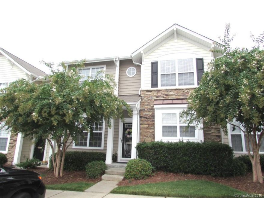 Beautifully updated home in great Fort Mill location.  Immaculate home with laminate wood floors, granite counter tops, custom back splash, stainless appliances, new fans and light fixtures, and the list goes on.  Bathrooms have been updated with new vanities, tile floors and new lighting.  Private fenced back patio with storage closet.  Nice community with a pool.