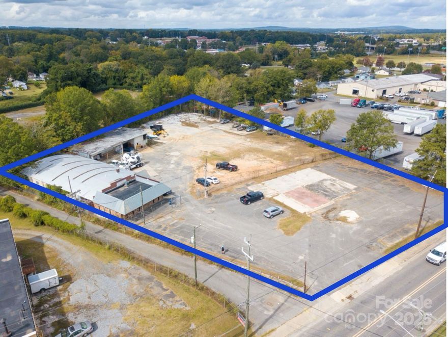 **Update, For sale or For Lease**

This high visibility 2.09-acre industrial site presents a rare opportunity just minutes from Downtown Gastonia, the FUSE District, Highway 321, and I-85. The property features a 6,676 SF main building with office and storage space with approximately 170 feet of road frontage and ample space for truck, fleet, or equipment parking, the site is well suited for contractors, logistics firms, or service providers and onsite living quarters that include a full bath, kitchen with stove and sink, and a closet, perfect for live/work setups or staff accommodations. The main building also includes a fully equipped commissary with a gas line ideal for catering operations or other food based businesses!
Additional onsite structures offer over 3,000 SF of garage and storage space, providing flexibility for expansion or auxiliary use.
Recent capital improvements completed in 2024 include a new roof, upgraded HVAC system, full lot grading, and a redesigned drainage system to ensure long term durability and site stability.
Whether you're expanding operations or envisioning a creative redevelopment, this property is a prime candidate for adaptive reuse think industrial hub, food incubator, or maker space.
