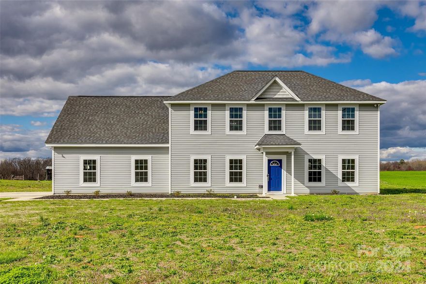 Escape to your private retreat in Union County! Set on almost an acre of land, this spacious home offers open concept living on the main level, perfect for relaxation and entertaining. Enjoy brand new LVP floors, abundant natural light, and a functional kitchen with quartz countertops. Retreat to the upper-level loft, which creates separation between the secondary bedrooms and the primary suite which has its own walk-in closet and ensuite bathroom. Each bedroom features a walk-in closet! Outside, the expansive backyard invites outdoor enjoyment. Conveniently situated near Wingate University, this home offers the ideal blend of privacy and convenience. Schedule your showing today and experience rural living at its best!