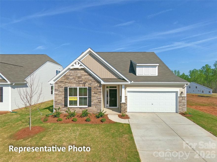 Brand new construction in an amenity-rich community less than two miles from Lake Norman! This 1.5-story Wescott plan has 3 bedrooms, 3 full baths, and more than 2,600 square feet of living space. The kitchen features white cabinets with a contrasting grey island, quartz counters, tile backsplash, a stainless range hood, and stainless appliances, including a gas cooktop. Matching base cabinets, counters, and backsplash extend into the breakfast area to create a buffet, which is perfect for entertaining. The primary suite is on the main has a tray ceiling in the bedroom and a luxury shower in the bathroom. The main floor also includes a formal dining room with tray ceiling, an office with French doors, family room with Cosmo fireplace, a secondary bedroom, a full bath with a 4-ft shower, laundry room, and a mud room with a built-in, beadboard drop zone. The upper floor has a loft, bedroom, and full bath with a tub/shower combo. Community amenities include a pool, cabana, pickleball courts, and pocket parks. Find out more today!