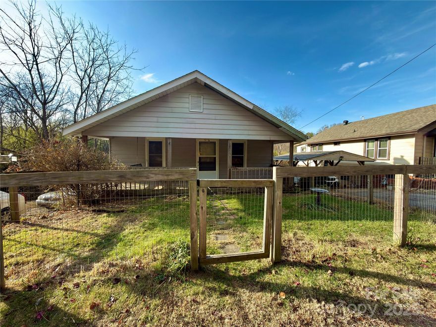 Great opportunity in a convenient West Asheville location—just minutes from Patton Avenue, Haywood Road, and downtown Asheville. 658 Emma Road offers quick access to shopping, dining, and major commuter routes while still maintaining a neighborhood feel.

This 2-bedroom, 1-bath home sits on a 0.32 lot and features a covered front porch and a fenced-in front yard, ideal for pets, gardening, or enjoying the outdoors. The home also includes a tall crawl space that provides extra storage and houses the washer and dryer—keeping laundry out of sight but easily accessible.

With a new roof installed in 2024 and a price point that leaves room for updates or customization, this property is a smart buy for investors, first-time buyers, or anyone looking to get into a walkable, central Asheville location.