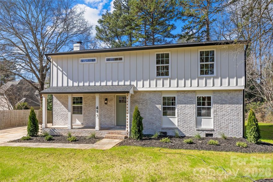 Exceptional home in the heart of highly desirable Stonehaven! Meticulously renovated inside and out in 2025 - 2026, this 4 bed / 2.5 bath home has 2,058 square feet of thoughtfully updated space designed for comfort, style, and easy everyday living. From the moment you arrive, the home’s inviting curb appeal and welcoming front porch create a lovely first impression. Inside, you will find a desirable floor plan, spacious room sizes, and abundant natural light throughout. Two separate living rooms on the main level offer flexibility and room to entertain while the stylish dining room provides another perfect setting for hosting gatherings. The renovated kitchen is a true standout featuring new cabinetry, quartz countertops, and a peninsula with bar seating. Upstairs, the tranquil primary suite is a private retreat with a walk-in closet and an updated en-suite bathroom highlighted by a frameless glass shower and modern fixtures. The three secondary bedrooms (including one that makes for an ideal home office) are well-appointed and share an upgraded hall bathroom with a double vanity and a tub-shower combination. Added updates include new LVP flooring, fresh interior and exterior paint, new windows, and stylish finishes that elevate the home’s overall appeal. Don't miss the covered back porch off the kitchen / family room, designed for enjoying indoor-outdoor living throughout the seasons. Situated on a generous lot with mature trees and refreshed landscaping, this property is tucked away on a peaceful street, yet remains close to everything Cotswold, SouthPark, and South Charlotte has to offer.