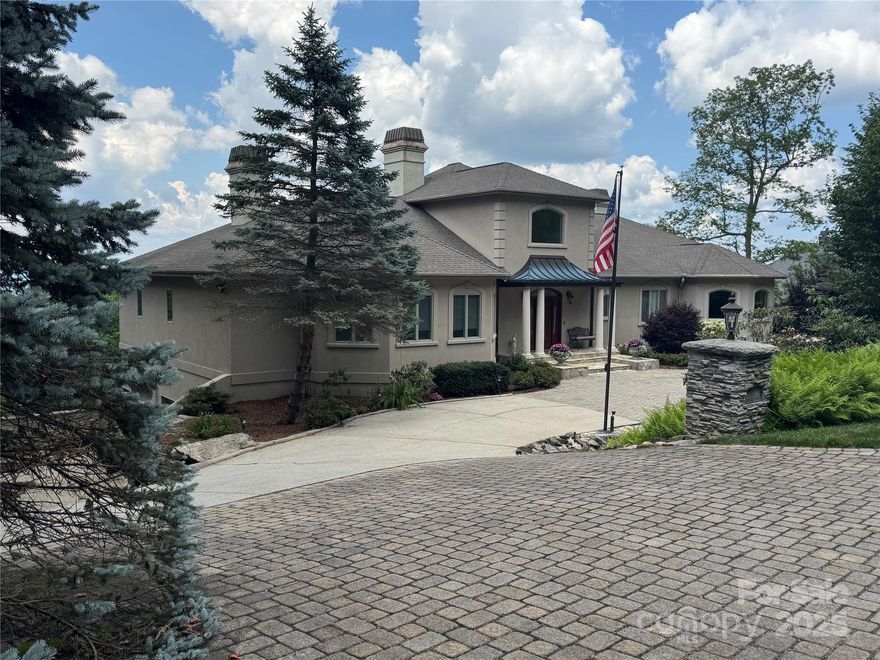 Upscale luxurious living at its best with majestic multi-range panoramic mountain views! The amazing architectural details and luxurious finishes of this home coupled with multi-level decking and the 60’ waterfall make it a showplace among its peers. This spectacular home is magnified by its vaulted ceilings, open concept, travertine and hardwood floors, arched doorways, great room with impressive fireplace and expanse of windows designed to capture the views, exquisite lighting fixtures, expansive gourmet kitchen/breakfast turret nook with upscale features and fireplace, luxurious master suite with fireplace and spa-like bath, fabulous study, family room with fireplace- ideal in-law suite, 2nd master on lower level and wine cellar. Outdoor living/entertaining options abound with the multi-level decking and sitting areas around the waterfall providing the ultimate in relaxed luxury mountain living. 3 plus car garage with work area. This is truly Upscale Living At Its Best!