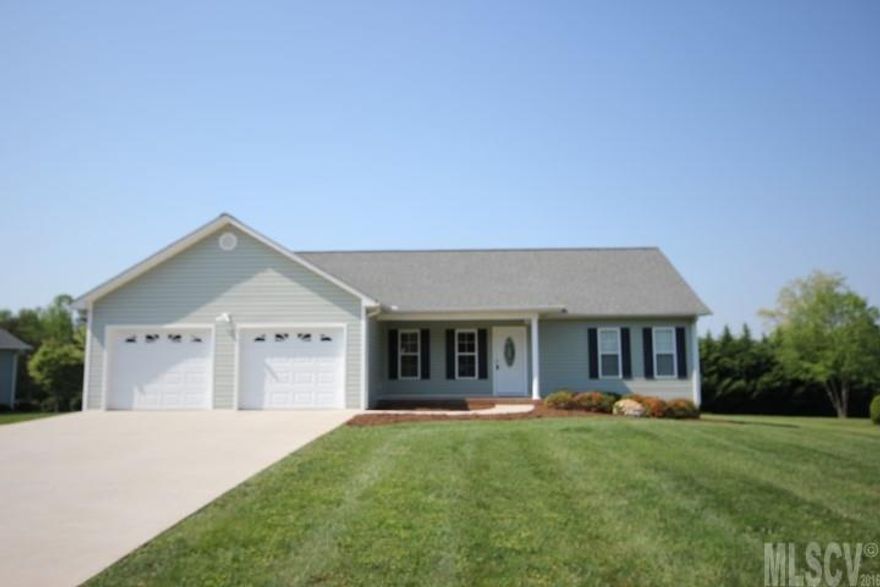 MOVE IN READY, ULTIMATE ENTERTAINING HOME!  This beautiful home has an open floor plan with neutral colors and beautiful hardwood floors! The kitchen includes a stainless steel double door refrigerator with bottom drawer freezer, microwave, electric range, dishwasher and plenty of counter space for food prep and entertaining! This home has a split bedroom floor plan, cathedral ceilings with embedded speakers and in-wall wiring to connect TV to the home speaker system. The large master bedroom also includes in-wall wiring that connects to the home speaker system, hardwood floors and a large master bath with tiled floors, large garden tub, shower and dual sinks. The master bath opens to a massive walk -in closet that is connected to the laundry room - how convenient is that??? One bedroom has been turned into a home theater w/surround sound that will blow you away! Large back deck and level yard! Large two car garage with built-in cabinetry & pull down attic access. Home is like new!!!