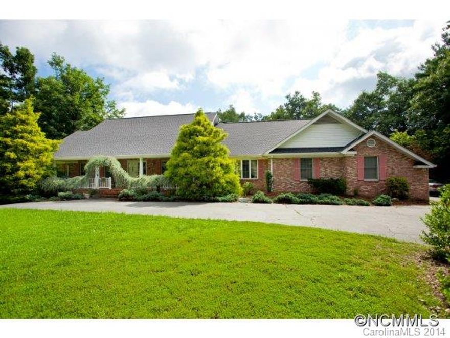 Remarkable 4 BR, 4 BA Williamsburg Brick home built to endure. Formal & informal living areas, gas FP. LL game room with bar, office, and guest quarters.  Sun tunnels. Front porch, screen porch and patio designed for outdoor enjoyment. Two-unit gas high efficiency HVAC system w/3 zones. 15 KW generator. New 40 year architectural roof, decks, gutters w/SS gutter guards. Security System. Main Lvl & LL garages w/workshop. Sold "as is"