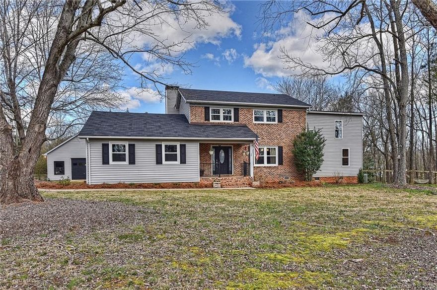 MULTIPLE OFFERS - HIGHEST AND BEST BY FEB. 21ST AT 5 PM. Amazing home located on 1.14 acres with 3 car garage (1 car attached, 2 car detached with workshop). 4 bedrooms, loft overlooking great room, 2.5 baths, den with gas log fireplace, 2 story great room, laminate floors in most of main level living area, ceramic tile in kitchen, breakfast and laundry, kitchen features gas range and Corian counters. Enjoy the outdoors on the covered front porch, rear deck or patio! Home warranty included!