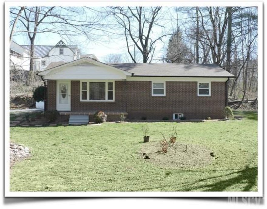 Wonderfully updated 3 bedroom, 1 bath home.  Features, new garage carport, new storm doors, brand new steel doors, new dishwasher, new stove, new windows, new roof, new heat pump, new tile floors and carpet. Full brick veneer , basement all cleaned and painted walls and floor.    Move in ready!