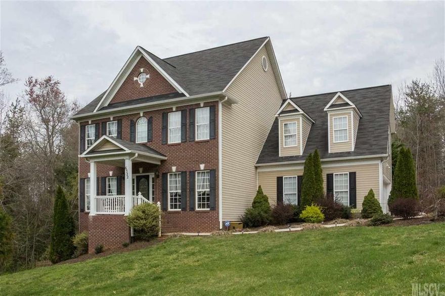 Beautiful, serene setting in this custom Grogan built home.  This house if full of architectural details such as arched doorways, extensive moldings, dramatic two story foyer, display niche and more.  Great floor plan for entertaining!  Open floor plan, with high ceilings, lovely screened porch and private back yard.  Lovely gourmet kitchen with granite counter tops and custom cabinetry.  You will love the second floor here...grand master suite, large laundry room, large private bedrooms and another full bath.  The walk out basement is ready to easily be finished.  Plumbed for bath already.  Lake front neighborhood with beautiful views!
