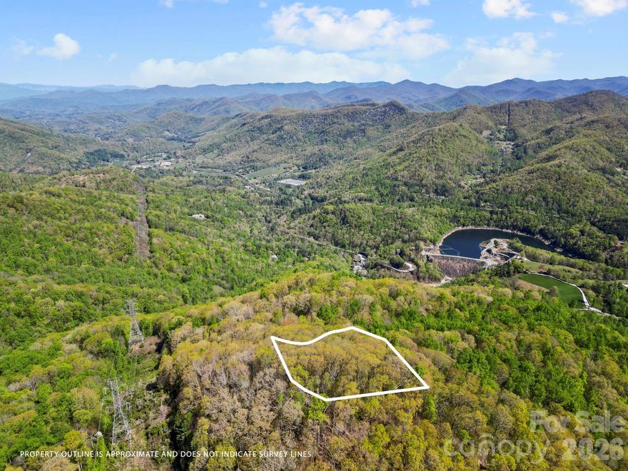 Have you been driving all over Creation looking for that great spot to build your new home? Sigh. You know you don't want to be in the shadow of the mountain or in a dark hole or next to a highway or where you have to grow your toenails out just to walk up your backyard. 

But then you see a house on that flat spot on a knob and think to yourself "Dang! I wish I could have found that spot and built my home there." Now is your chance! Sitting at around 3,300 feet, this home site has a fantastic building spot with the potential for one level living and views.  

Conveniently located only 16 miles from Sylva, 19 miles from Cashiers and just 11 miles from Western Carolina University.  If you want hiking or fishing, well you are pretty much right in the middle of it all. It is located just outside the Bear Lake Reserve community and is now being offered below tax value. When you see it you'll understand. You need to jump on this one!