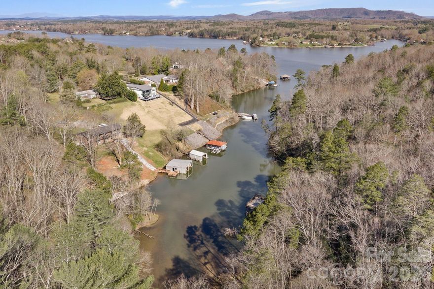 Welcome to your perfect lake escape at 6234 Ruffin Ln—where privacy, comfort, and unforgettable memories come together.
Tucked away in a quiet, private cove, this waterfront property offers the peaceful lake lifestyle you’ve been searching for. Whether you're enjoying your morning coffee by the water, spending the day boating, or winding down with sunset views, this home creates the kind of setting that never gets old.
Inside, you’ll find thoughtful updates throughout, blending modern convenience with relaxed lake charm. The layout is ideal for both everyday living and entertaining, with inviting spaces designed with comfortable bringing family and friends together.
Outside this property continues to shine—plenty of parking means guests are always welcome, and the private setting makes every gathering feel like a getaway. From summer cookouts to cozy fall weekends, this is a place where traditions are built and memories are made year after year.
Additional highlight includes a Guardian generator, an 8 Camera security system, a touchless automatic boat cover, offering added convenience and peace of mind.

If you’ve been dreaming about lake life with a balance of privacy, updates, and space to enjoy it all—this is it.