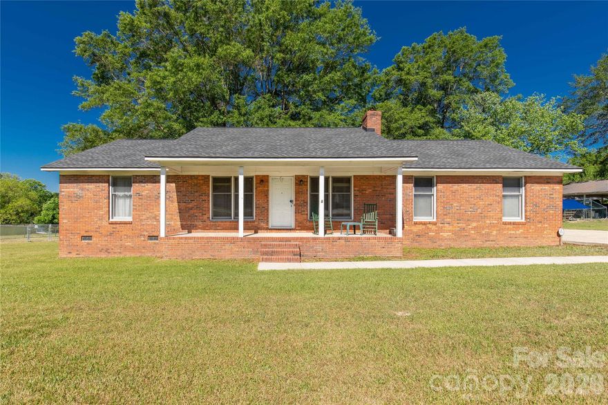 There’s a certain kind of home that doesn’t just check boxes… it quietly builds a life around you. This is that home.

Welcome to an affordable brick home on 0.59 acres where charm, function, and future potential all sit on the same front porch—literally. Rocking chair mornings begin on the covered front porch, coffee in hand, while evenings wind down out back on your covered rear porch, overlooking a fenced backyard and a peaceful pond view that feels like your own private retreat.

Inside, you’ll find a 2-bedroom, 1.5-bath layout designed for simplicity and comfort, anchored by a cozy wood-burning fireplace in the living room—the kind that makes winter nights feel like a scene from your favorite movie. The large utility room with built-in shelving keeps life organized, practical, and just a little bit easier.

Now let’s talk value—because this one delivers.

You’ve got an attached 2-car garage, a detached carport, and a wired workshop ready for projects, hobbies, storage, or that side hustle you’ve been dreaming about. Whether you're a craftsman, collector, or just someone who appreciates space to do things, this property gives you options.

And the big-ticket item? Already handled.
The roof was replaced in 2025, giving you peace of mind and one less thing on your to-do list.

This home is perfect for buyers searching for: Affordable homes with land, brick homes with workshops and garages, homes with fenced yards and outdoor living space, investment opportunities or homes to update and customize, & quiet country-style living with scenic views.

Because here’s the magic…
This isn’t just a move-in—it’s a move-forward.

There’s room here to add your style, build equity, and create something that reflects you. Whether you're a first-time homebuyer, downsizing, or looking for a smart investment property, this home gives you the foundation—and the freedom—to make it yours.

Opportunities like this don’t whisper… they echo. And this one is calling you home.