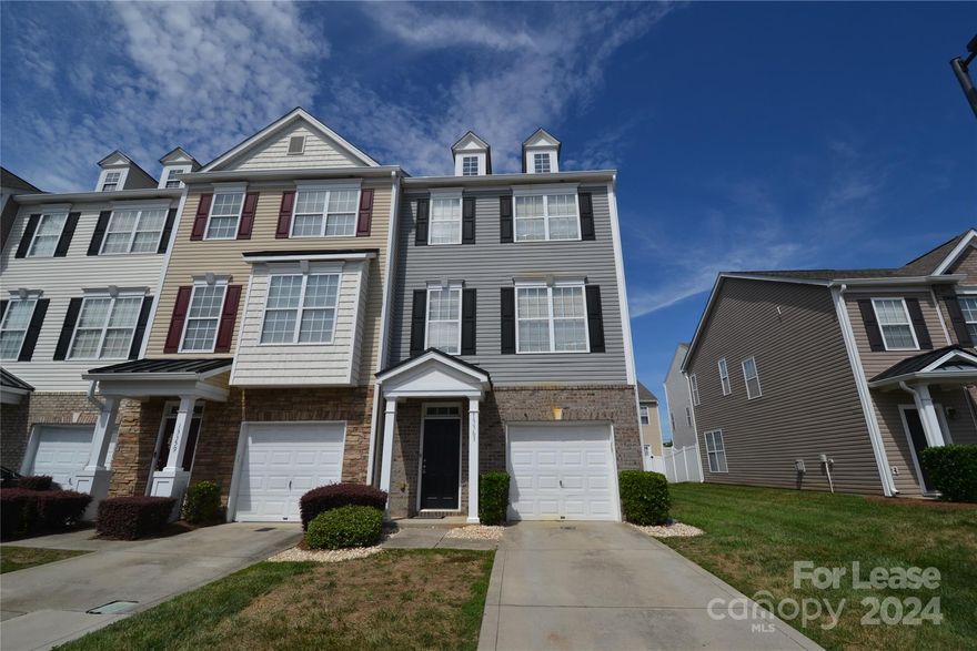 FRESHLY Painted and new carpet throughout - 3-Story end unit with large Bonus/Bedroom and garage on first floor. Beautiful kitchen with center island and breakfast area, great deck on mid-level for evening lounging and hanging out, open living room with gas fireplace, dining area and half bath on 2nd floor. Dual master bedrooms with private full bathrooms on 3rd floor. One features vaulted ceiling and a bathroom featuring dual sinks, garden tub, separate shower and walk in closet and fenced patio area off bonus/bedroom on first floor. Community Pool for those HOT summer afternoons. Pets are conditional and must be approved.