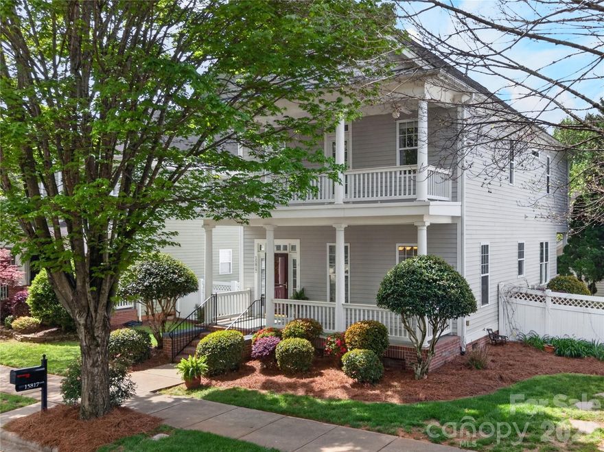 This one owner home in Birkdale Village reminds most of often of Charleston homes with it's open floor plan, historic style and quality finishes.  This home offers more than it's private garden oasis, open living area with wonderful natural light. It offers the nearby marinas with the best of Lake Norman living.   This community also offers tree lined sidewalks that lead you to an active lifestyle with access to  miles of trails throughout Cornelius, wonderful dining, first class shopping, pickleball, Birkdale Golf and community amenities that include pickleball, pool & tennis. Robinson Park  is just around the corner as well.  The giant front first floor porch  is perfect for morning cups of coffee or evening drinks.  Just off the foyer with its high ceilings and gleaming hardwood, the dining room awaits your special occasions and favorite guests.The kitchen with its expansive counter space is open to the breakfast and family room.  Step out of the primary on to your second floor balcony or  cozy back porch for the perfect place to read that thriller you've been waiting on or afternoon tea.
Entertain in the fenced in backyard. Private patio surrounded by lush mature landscaping.This spring and every season will be a delight to see what blooms. The family that lived here loved gardening, they even have room for a vegetable garden. Enjoy all that Lake Norman has to offer or pop out to I-77 to only minutes to Charlotte for world class  ARTS, Theatre, NFL,  and NBA.