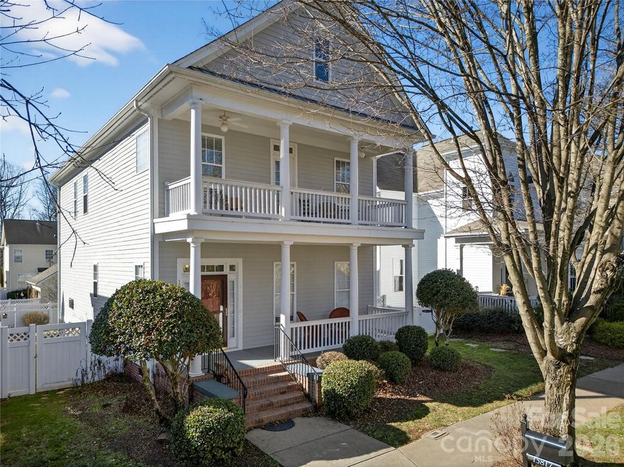 This one owner Saussy Burbank home in Birkdale Village reminds most often of Charleston with it's open floor plan, historic style and quality finishes.  This home offers more than it's private garden oasis, open living area with wonderful natural light. It offers tree lined sidewalks that lead you to an active lifestyle with access to miles of trails throughout Huntersville and Cornelius, wonderful dining, first class shopping, pickleball, Birkdale Golf and community amenities that include pool & tennis. Robinson Park  is just around the corner as well.  The giant front first floor porch  is perfect for morning cups of coffee or evening drinks.  Just off the foyer with its high ceilings and gleaming hardwood, the dining room awaits your special occasions and favorite guests.The kitchen with its expansive counter space is open to the breakfast and family room.  Step out of the primary on to your second floor balcony for the perfect place to read that thriller you've been waiting on or afternoon tea.
Entertain in the fenced in backyard. Private patio surrounded by lush mature landscaping.This spring and every season will be a delight to see what blooms. The family that lived here loved gardening, they even have room for a vegetable garden. Enjoy all that Lake Norman has to offer or pop out to I-77 to only minutes to Charlotte for world class  ARTS, Theatre, NFL,  and NBA.