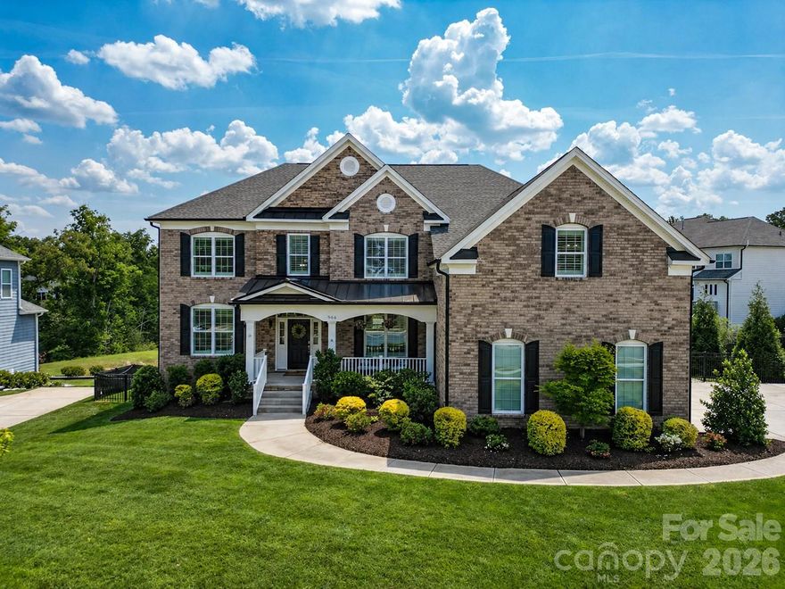 Welcome to this stunning luxury residence in the highly sought-after Bent Creek community, zoned for top-rated Indian Land schools. Offering over 4,400 square feet of thoughtfully designed living space, this 5-bedroom, 4-bath home is truly turnkey—every detail has been meticulously curated. The main level features wide plank hardwood floors, a private guest suite with full bath access, and an impressive great room anchored by custom built-ins and a striking stone fireplace. The heart of the home is the chef’s kitchen, showcasing custom cabinetry, an oversized island with seating, double ovens, gas cooktop, stainless steel appliances, and a spacious pantry. First floor is finished with an oversized laundry that leads to a thoughtfully designed pet retreat with seamless indoor-outdoor access. Upstairs, the luxurious primary suite offers a private sitting/flex room—ideal for a home office, nursery, or fitness space—along with three custom walk-in closets and a spa-inspired bath complete with a soaking tub, seamless glass shower, and dual vanities. Step outside to your own private oasis featuring a heated pool and spa, expansive paver patio, custom outdoor fireplace with built-in seating, built-in grill with island...perfect for entertaining, and a large Trex deck overlooking it all—perfect for relaxing year-round. Additional features include plantation shutters, extra high crawlspace and a 3rd car garage. Ideally located near shopping, dining, and entertainment, this home is perfectly positioned between Fort Mill, Ballantyne, and Waxhaw, NC. Enjoy close proximity to the brand-new Super Target and Costco—everything you need right at your fingertips.