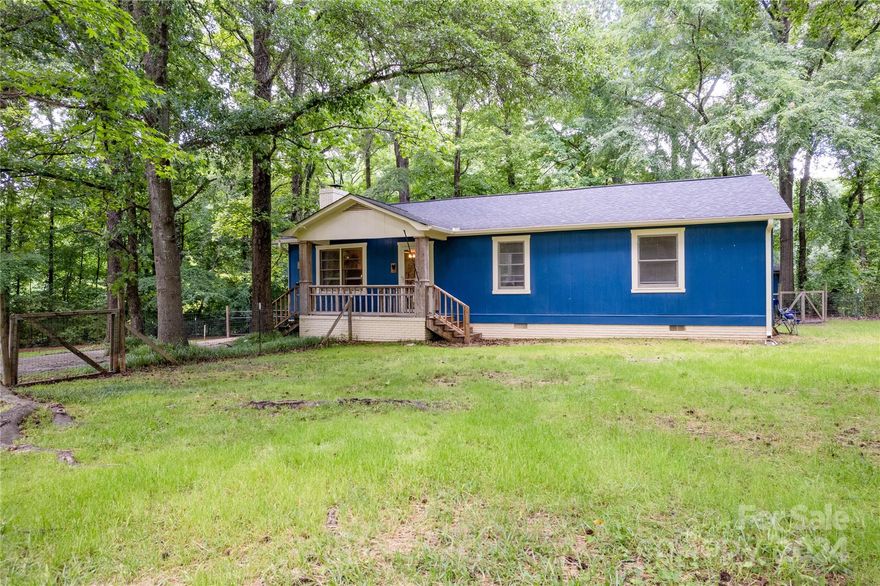 Truly the best of both worlds! Just minutes from all the shopping and restaurants of Dave Lyle, very close to I-77, and downtown Rock Hill, but has the feel of Carolina country living. Come see this beautifully updated three bed, two bath home. The exterior features a fenced yard with a firepit, carport, 16x22 workshop that is wired for 220 amps, all sitting on 1 acre. New LVP flooring just installed, new granite kitchen counters, and new kitchen island. Roof and gutters were installed in 2018. HVAC and ductwork was replaced in 2015 and still has 1 year left on a transferable warranty. All plumbing lines in crawl space were replaced in 2023. No HOA! Come see this loved and well maintained home and put an offer in before it is gone!