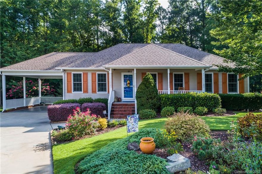 Back on Market at no fault of seller! Come sip on a glass of tea in the 3 seasons room while overlooking the tranquil backyard! No detail was spared in the design including zoysia sod ('16), white stone pathways, and the gorgeous greenery between! Well maintained home with brand new windows throughout!  It's nestled in the back of the neighborhood in the cul de sac with larger lot than most neighbors.