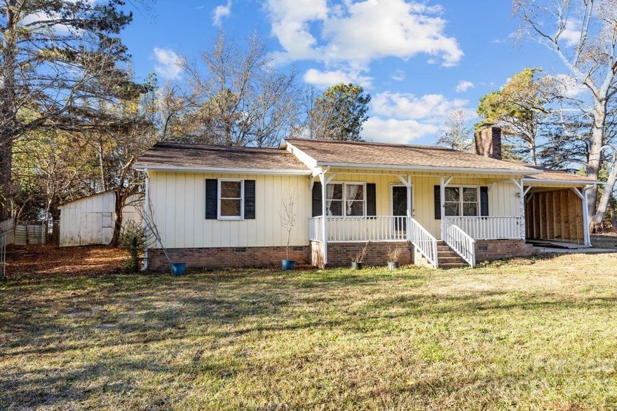 Investor Special! Tons of potential for this 3 Bed 2 Bath Ranch sitting on 1 acre. Conveniently located to shopping, dining, and I-77. Located next to the airport and in an area that is seeing massive growth! Sold As-IS