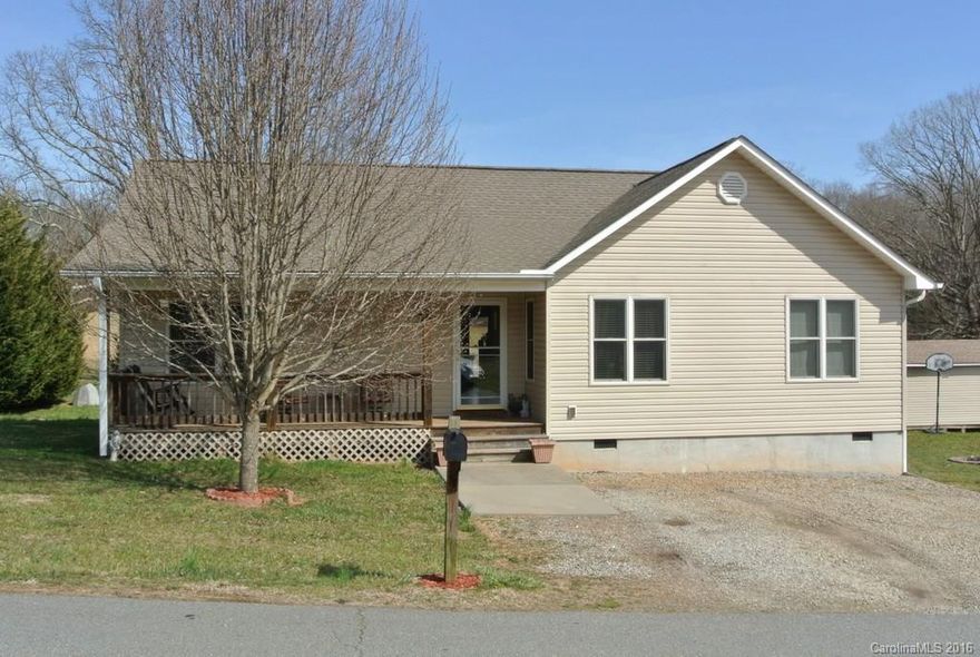 Well-kept home w/ a large, open kitchen & split bedroom plan. The living room has lovely handscraped laminate floors & a cozy gas stove. The master boasts 2 closets & an ensuite bath. Spend time outdoors on the large deck or swimming in your above-ground pool. There is an additional 12x20 storage shed with power for your leisure time endeavors. Great level .47ac yard for kids, pets or gardening.