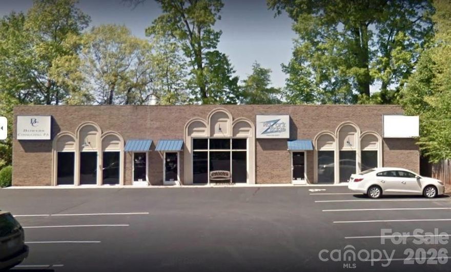 BOUNDARY POINTE CONDOMINIUM office offering 924 sq. ft. is now available for sale. Investors and business owners—don’t miss this desirable end unit! Step into a welcoming lobby featuring a designated receptionist area. Behind the reception space, you’ll find an open office area with double-door enclosed storage. In addition to the front office space, there are two separate private offices, both equipped with ample built-in cabinetry and granite countertop workspace. The rear office includes a private shower and wet bar sink for added convenience. A centrally located large half bath serves the unit. Interior upgrades include chair rail molding and a tiled entry floorspace. Conveniently situated just off Jake Alexander Boulevard and only minutes from I-85, Boundary Pointe offers a high-traffic location with ample parking.