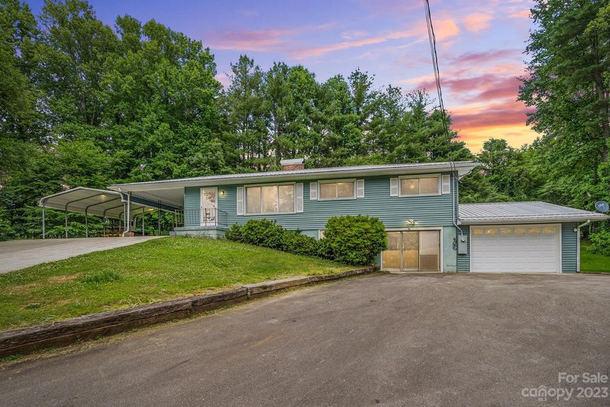 Check out this Deal! Listed at $295,000.00
Welcome to 51 Pinecola Drive in the beautiful Island Ford area of Brevard which leaves you just minutes to Pisgah National Forest or Dupont State Forest ! This Simple ranch home has ample living space on both levels. Main level offers 3 bedrooms 1 1/2 baths with a wood burning fireplace. The lower level is a versatile space, currently set up as a mother-in-law suite. It features a full kitchen, full bath, dining area, laundry area, and a bonus room (please note, no permit found). This space offers endless possibilities, whether for extended family, rental income, or your personal use. Upper level has an open carport while the lower level offers a 1 car garage. Short term rental allowed. The property itself is UNRESTRICTED. Aprox 1 Acre of mostly cleared level yard. Originally this home was listed with a 30X50 shop. That is no longer part of the sale. Schedule a showing today before this gone!
ONLY A PORTION OF  PARCEL 8584-203-454-000