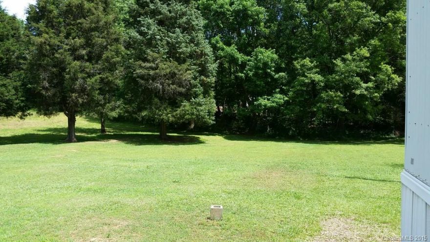 This property is being listed for .868 acre of land only....the manufactured home and outbuilding have no value.