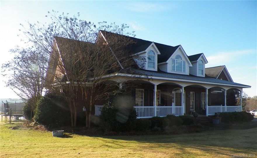 Don't miss this spacious 2 story brick house located on 3.9 ac.!  It features a 24' cathedral ceiling in great room w/gas logs & other built ins, entry, study/dining with heart pine flooring, irrigated front and rear yard w/Bermuda sod, in ground pool with rear fenced yard, concrete driveway, finished 700+- sf bonus room over two car garage, 1st floor master bedroom/bath and guest bedroom with private bathroom, half bath, utility, kitchen & breakfast area.  2nd floor balcony, 2BR and 2Baths.
