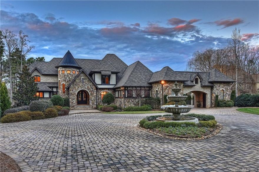 Breathtaking estate  impeccably designed with exquisite details, custom millwork & exceptional selections throughout. Gourmet kitchen with custom cabinetry, Viking appliances, butler’s pantry & opens to great room. Owner’s suite has vaulted ceiling, luxurious bathroom with stunning solid marble soaking tub & dual closets. Spacious lower level offers an entertainment bar, wine room, theatre, billiards & guest suite. Lavish outdoor living area with a resort-style infinity pool/spa. 4 car garage