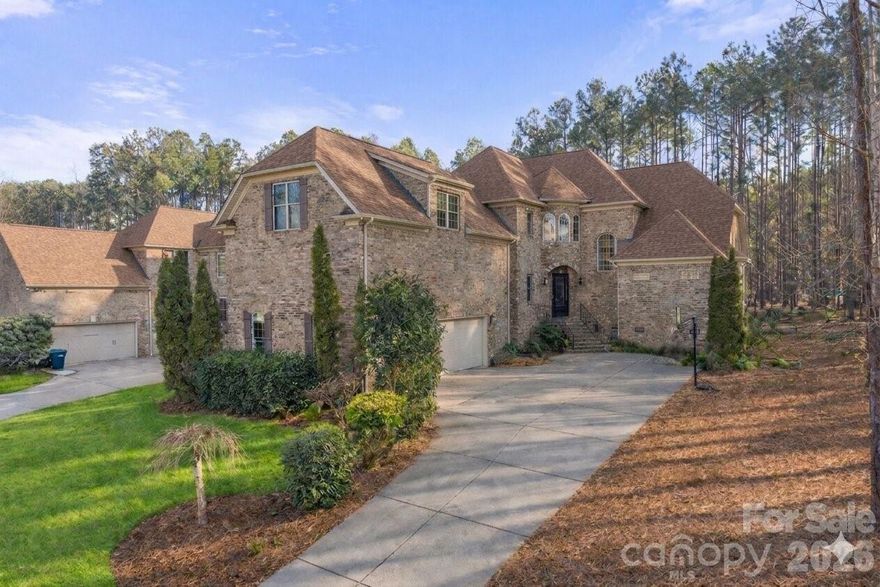 Be prepared to fall in love! Tucked away in a peaceful enclave just minutes from Allison Creek State Park (located on the shores of Lake Wylie), this full brick & textured stone exterior timeless "castle like design" custom home offers an exceptional blend of refined living & natural tranquility. Thoughtfully designed & very well maintained, the home exudes timeless elegance with solid construction, graceful architectural lines, & an inviting presence. From the moment you arrive, you will notice the soaring vaulted ceilings, open floor plan, UVA protected Roman blinds, plush wood flooring & crown moulding throughout. Inside, generous living spaces are filled with natural light, creating a calm & welcoming atmosphere ideal for both everyday living & effortless entertaining. The layout flows seamlessly, offering comfort, privacy, and versatility throughout. All 4 bedrooms have their own private full bathroom. Seller enjoys spending solitude time in the peaceful study room. Whether enjoying quiet mornings or hosting intimate gatherings, this home delivers a sense of ease and sophistication. 2025 water heater, trex back yard deck, top of the line security system (prewired throughout) with motion sensors, front & side inground irrigation. Oversized three car garage. Mature landscaping & trees. HOA includes boat/rv/jet ski & trailer storage, pool & walking trails. Award winning Clover schools, short driving distance to Charlotte airport, shopping, hospitals, restaurants, trails & low SC property taxes are a big plus!