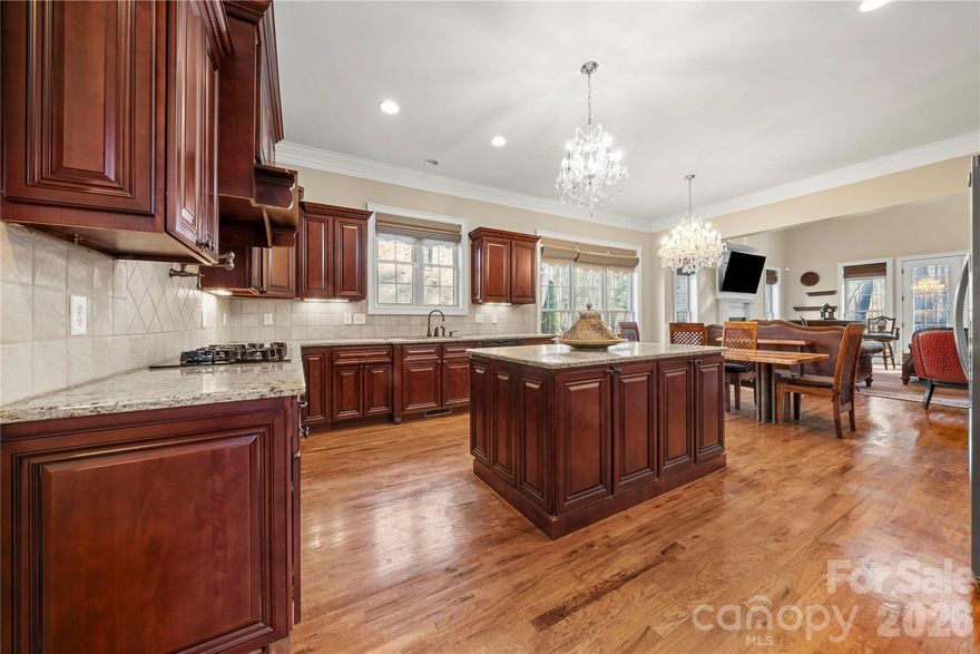 Be prepared to fall in love. Tucked away in a peaceful enclave just minutes from Allison Creek State Park on the shores of Lake Wylie, this full brick and textured stone custom home offers an exceptional blend of refined living and natural tranquility.

Thoughtfully designed and meticulously maintained, the home showcases timeless architecture, solid construction, and striking curb appeal with elegant stone accents and inviting presence. From the moment you arrive, you’re welcomed by soaring vaulted ceilings, an open and airy floor plan, UV-protected Roman blinds, rich wood flooring, and detailed crown molding throughout.

Inside, expansive living spaces are filled with natural light, creating a warm and inviting atmosphere ideal for both everyday living and effortless entertaining. The layout flows seamlessly, offering the perfect balance of comfort, privacy, and functionality. Each of the four bedrooms features its own private full bath, while a quiet study provides the perfect retreat for work or relaxation.

Whether enjoying peaceful mornings or hosting intimate gatherings, this home delivers a true sense of ease and sophistication. Includes 2025 water heater, Trex backyard deck, and a top-of-the-line prewired security system with motion sensors. Additional highlights include an oversized three-car garage, in-ground irrigation, and mature landscaping that enhances the home’s private setting.

Community amenities include boat, RV, jet ski, and trailer storage, along with a pool and walking trails. Located in the award-winning Clover School District with low South Carolina property taxes, and just a short drive to Charlotte Douglas International Airport, shopping, dining, and medical facilities—this home truly offers the best of convenience and lifestyle.