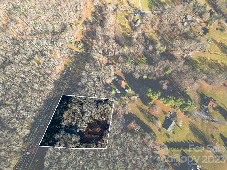 Offering a newly graded driveway and recently installed 4BR septic system, this +/- 3 acre tract in Mills River is ready for your next building project and/or dream home. With varying topography and long range mountain views, this acreages offers a little bit of everything--privately situated at the end of a cul-de-sac, in the highly desirable Mills River area. Live in a location that is 10 minutes from the Asheville Airport yet only 15 minutes from the main entrance to Pisgah National Forest. Given the driveway and 4BR septic are already in place, this lot offers an expedited timeline toward the completion of your next custom home!