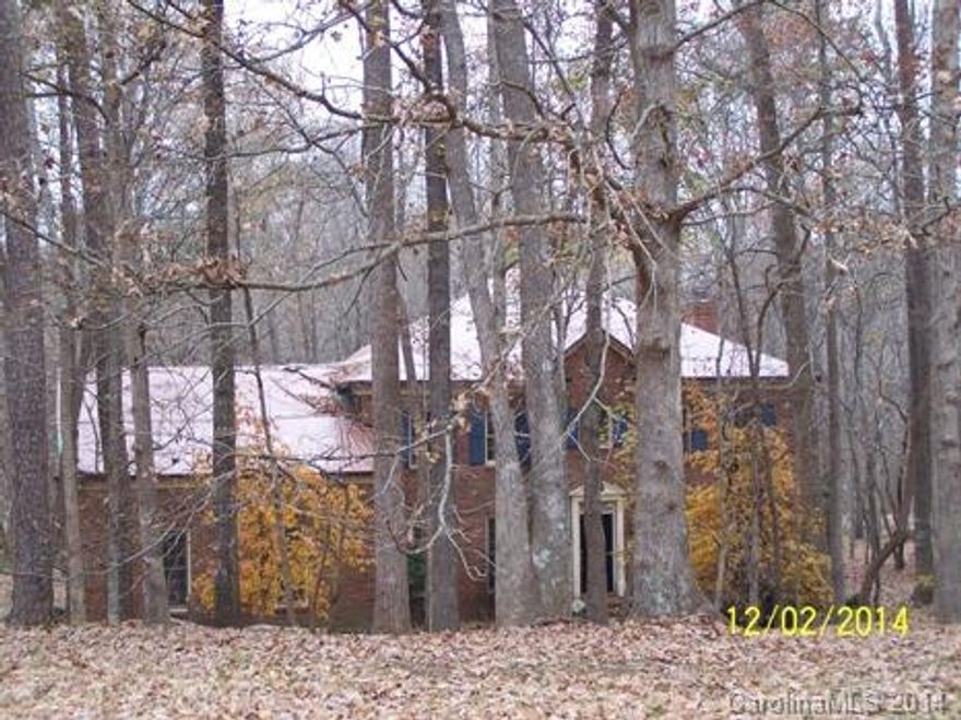 Lovely wooded lot surrounds this 2 story traditional full brick home. Formal areas plus a large family room with built in shelving and a cozy fireplace make this a versatile home. The breakfast area has a bow window overlooking the private back yard. There is a separate bonus room above the large 2 car garage. All bedrooms are good sized with the master having a separate sitting area, a walk in closet and a bath with separate tub, shower, and dressing area. Caliber Home Loan prequal required.
