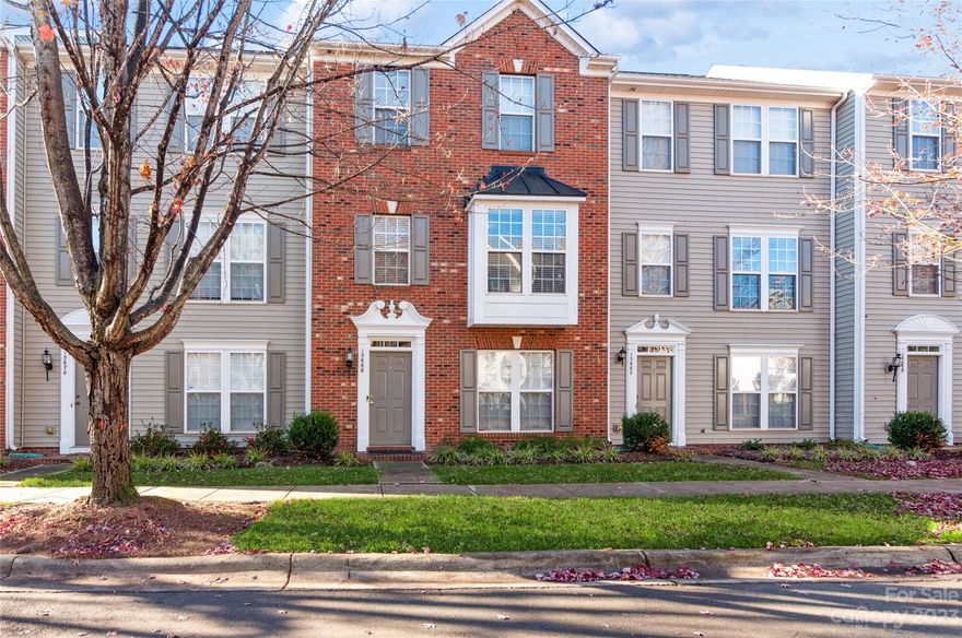 Incredible Ballantyne location, hard to find these days at this price. Townhome is tucked away in the neighborhood & boasts 3 floors of living space. Lower/Entrance level has 3rd bedroom/office space depending on buyers needs/wants with French doors along with half bath. Main level features a large living room with pre finished hardwoods, dining room area & large kitchen with island, Corian counter tops, half bath & access to 2nd floor balcony just off living room. Third floor has a great size primary bedroom with walk in closet, large tiled shower with beautiful glass doors. Second bedroom, also on third floor could be considered a second primary with full bath. Neighborhood has great amenities with an outdoor pool, recreation area & playground. Seller has quote for new carpet (in attachments) and is willing to replace before closing or give credit at closing for the quoted amount. Currently a tenant living in the unit so we did not want to replace carpet at this point.